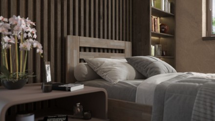 Łóżko z litego buku lub dębu, sprawiające wrażenie lekkiego