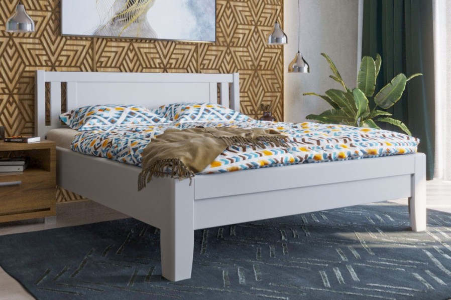 Solidne wykonane masywne łóżko Sion K2 stanie się godną ozdobą Twojej sypialni, wprowadzając do niej przytulność i komfort.