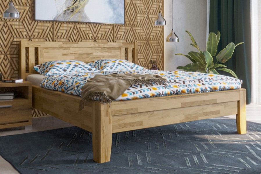 Solidne wykonane masywne łóżko Sion K2 stanie się godną ozdobą Twojej sypialni, wprowadzając do niej przytulność i komfort.