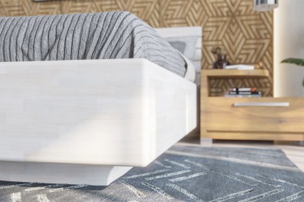 Łóżko wygląda tak, jakby za chwilkę miało unieść się w powietrzu.