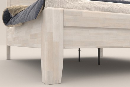 Solidne wykonane masywne łóżko Sion K1 stanie się godną ozdobą Twojej sypialni, wprowadzając do niej przytulność i komfort.