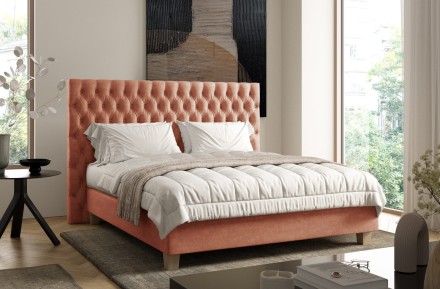 Eleganckie, tapicerowane łóżko boxspring Grand zapewni Ci naprawdę luksusowy odpoczynek. Podstawa łóżka została skonstruowana w systemie boxspring, a w przeciwieństwie do standardowych modeli wzbogacono ją o solidne bukowe lamele pełniące rolę stelaża pod materac. Możesz wybierać spośród kilku tkanin i rozmiarów, dzięki czemu dobierzesz wariant idealnie odpowiadający Twoim potrzebom.