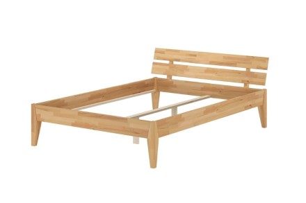 Wspaniałe łóżko z litego drewna, wykonane z olejowanego dębu. W łóżku widocznych jest mnóstwo naturalnych szczelin i ubytków, jakie pojawiają się w drewnie wraz z biegiem lat.