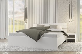Laminowana płyta wiórowa o grubości 25 mm, zapewnia stabilność i wytrzymałość konstrukcyjną całego łóżka.
