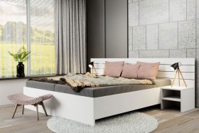 Laminowana płyta wiórowa o grubości 25 mm, zapewnia stabilność i wytrzymałość konstrukcyjną całego łóżka.