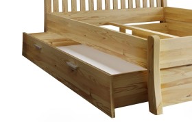 Drewniana, sosnowa szuflada pod łóżko Felix. Dostępna w kolorze naturalnym lub w kolorze białym.